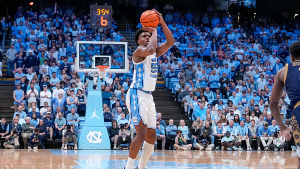 North Carolina Tar Heels forward Harrison Ingram shoots a three-point shot against the Notre Dame Fighting Irish.
